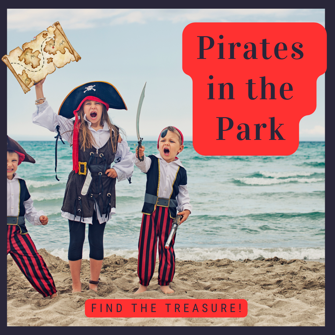 Three Children dressed as pirates with a map and sword